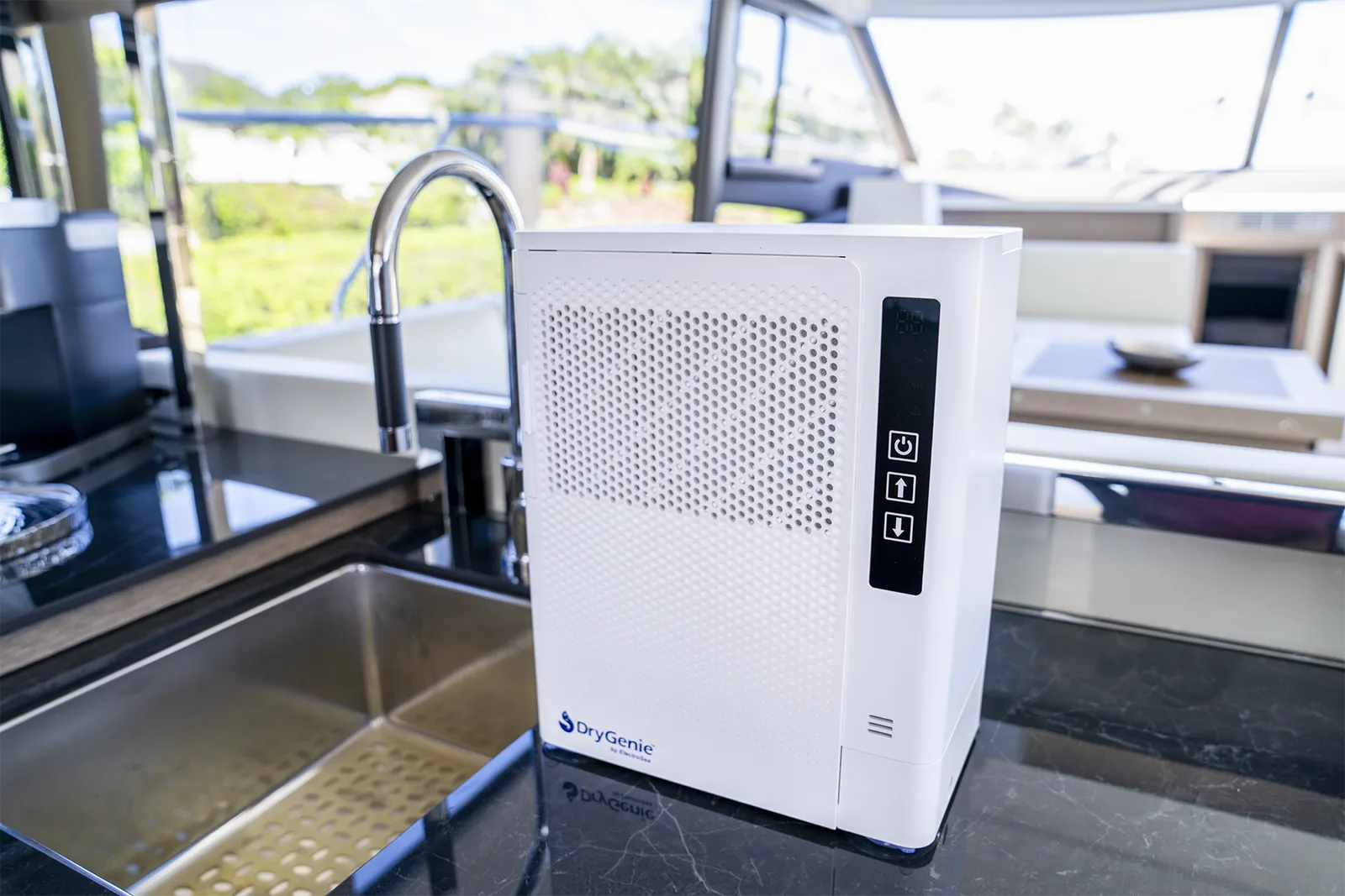 DryGenie marine dehumidifier installed in the galley on a Prestige Yacht